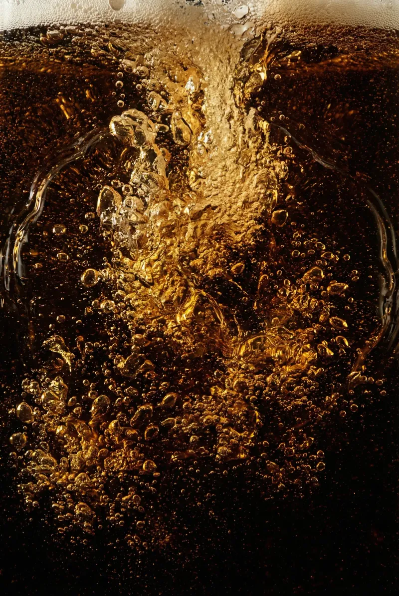 Beer pour macro detail, carbonation and foam in motion