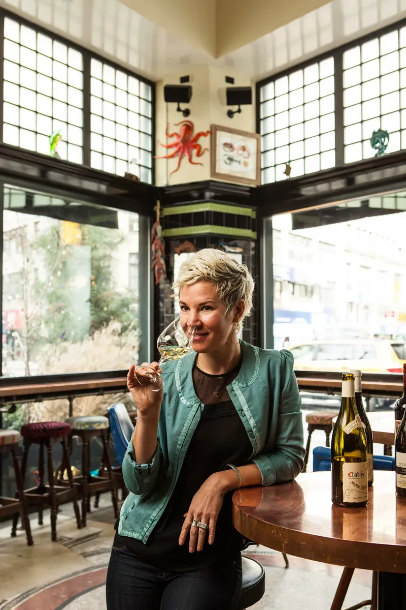Bartender serving a cocktail in a candid hospitality lifestyle moment