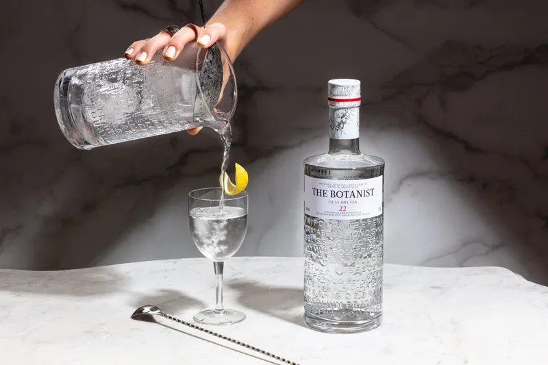 Botanist gin and martini serve, bottle packshot on white