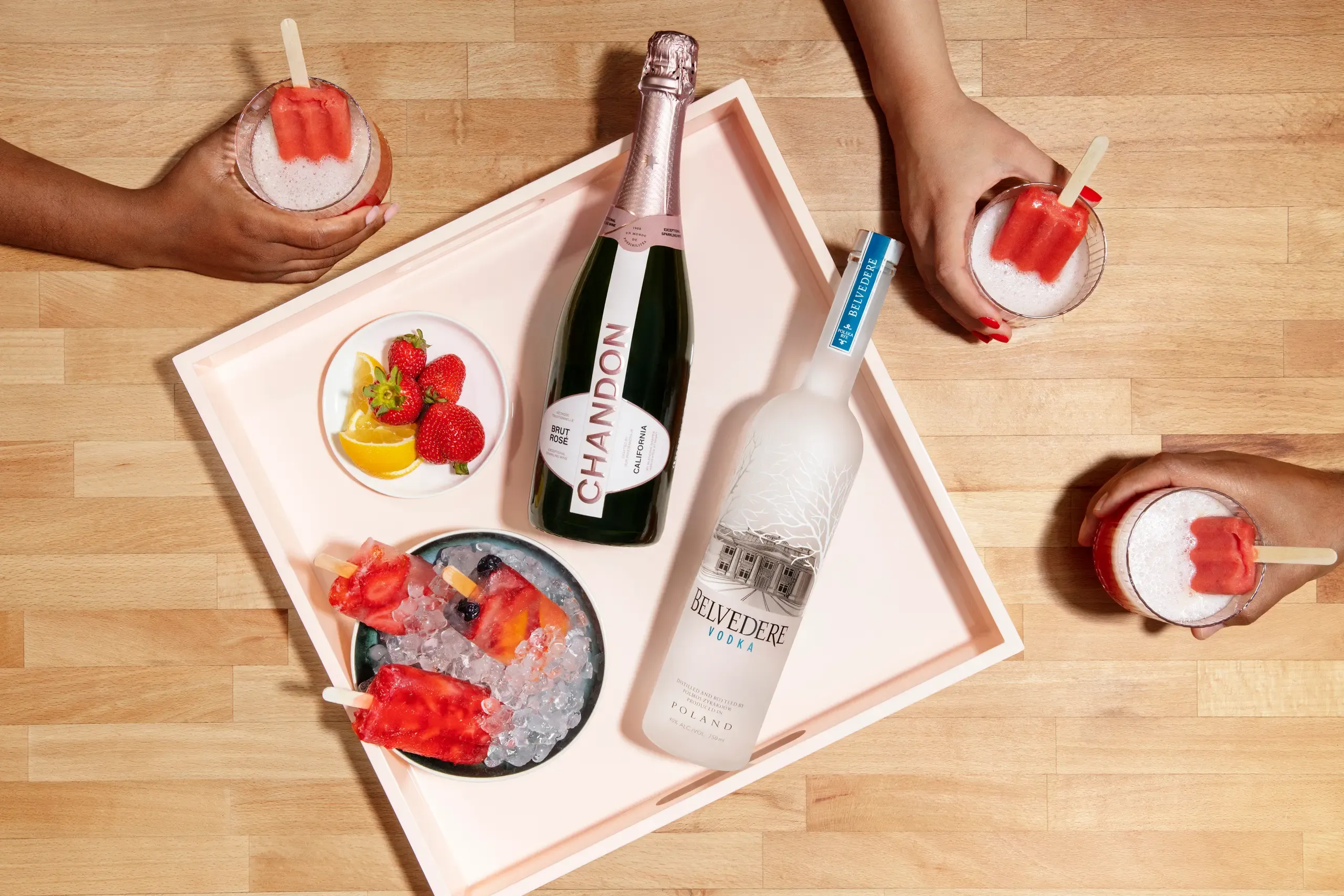 Top down spirits advertising composition with even, controlled highlights