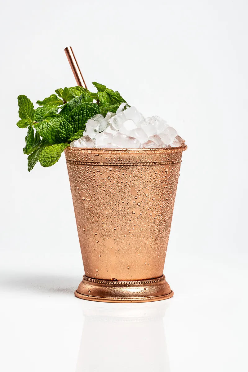 Koloa Rum coconut mint julep cocktail on a white background