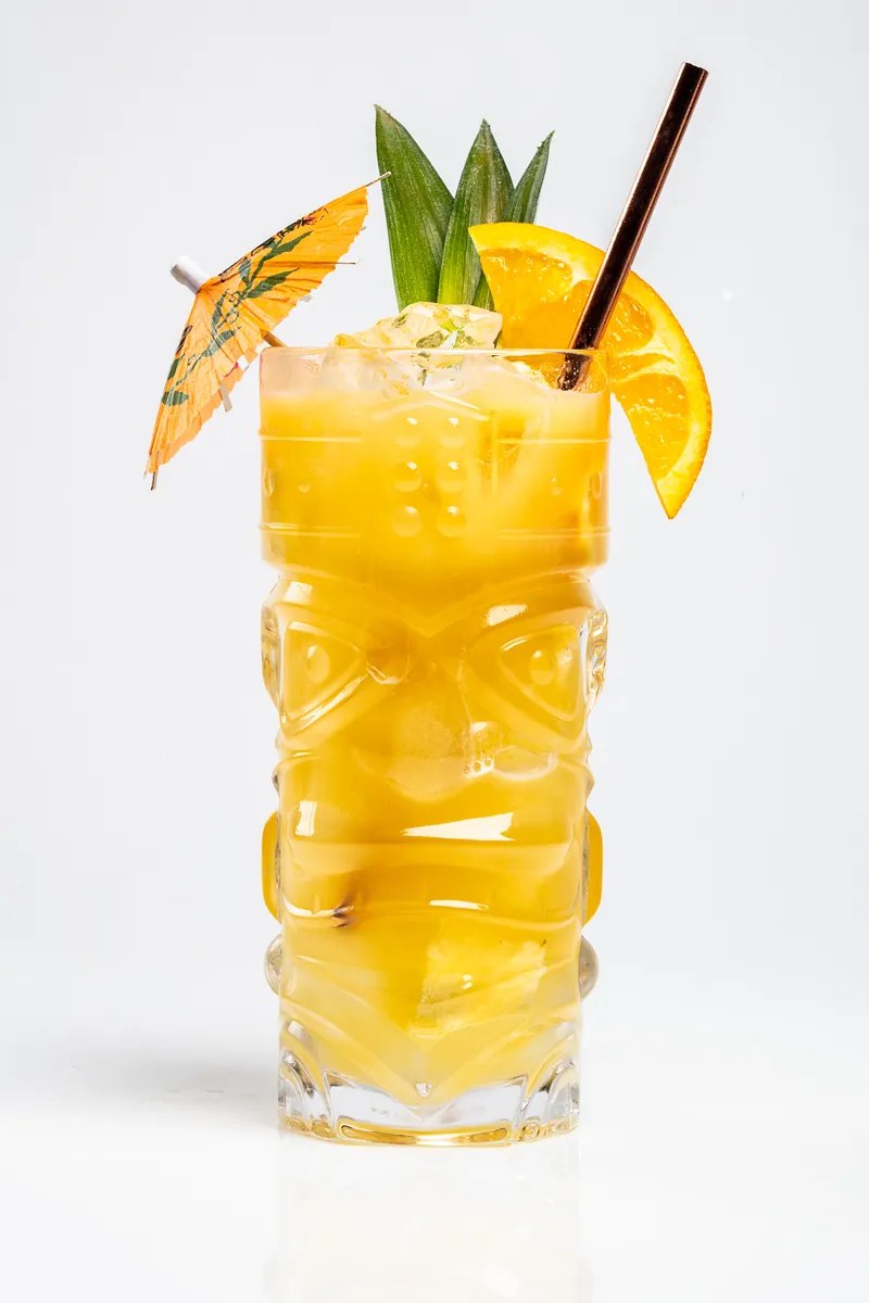 Koloa Rum spiced pineapple rum punch cocktail on white