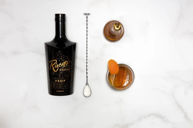 Rivente cognac bottle on a white background, alternate angle