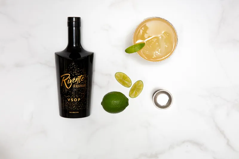 Rivente cognac bottle packshot on white for ecommerce