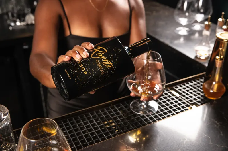 Rivente cognac advertising hero with warm directional light