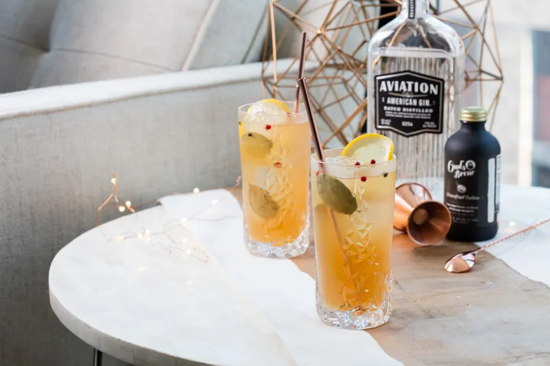 Dramatic craft cocktail lit with directional studio lighting