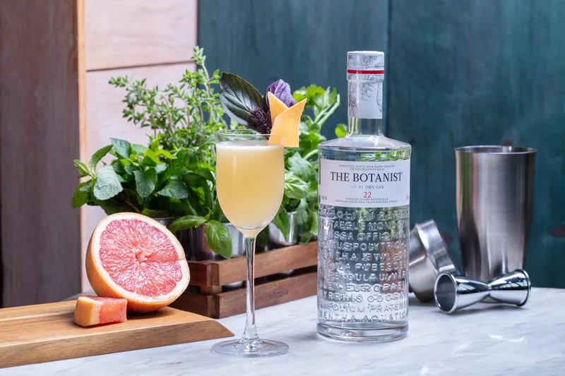 Vodka cocktail advertising photograph with clean studio lighting
